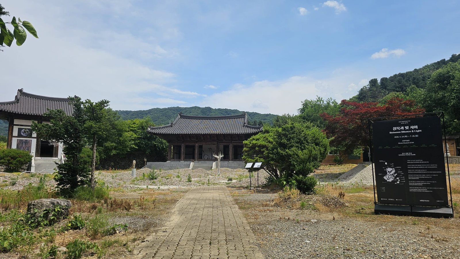 Halls of the Baengnyeonsa precinct with the exhibition sign